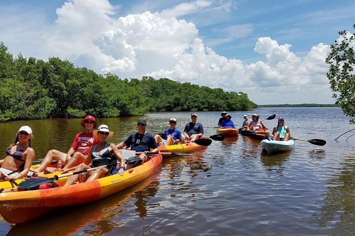 people on a kayak tour in estero bay